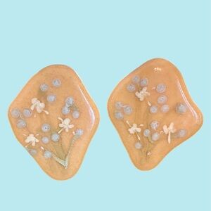 Vintage NOS 1980-90s Earrings featuring a yellow resin base with floral designs